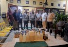 Polsek-Kota-Raja-Intensifkan-Patroli,-Sita-Ratusan-Botol-Miras-Ilegal-Guna-Ciptakan-Kondisi-Aman.