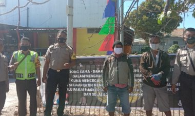 Panit-Binmas-Polsek-Maulafa-Bersama-Para-Babinkamtibmas-polsek-Maulafa-Pasang--Spanduk-Himbauan